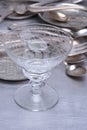 Silver table setting with fork, knife, spoon and glass Royalty Free Stock Photo