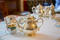 Silver teapot and bowl of sugar, traditional English afternoon tea ceremony Royalty Free Stock Photo