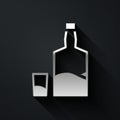 Silver Tequila bottle and shot glass icon isolated on black background. Mexican alcohol drink. Long shadow style. Vector Royalty Free Stock Photo