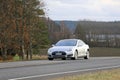 Silver Tesla Model S Electric Car On the Road Royalty Free Stock Photo