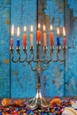 Silver traditional Hanukkah candles all candle lite on the menorah Royalty Free Stock Photo