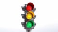 silver traffic light with all illuminated colors isolated on white background Royalty Free Stock Photo