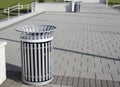 Silver Trashcan on Brick Pavers