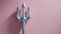 Silver trident against a pink background, minimalistic and bold. Royalty Free Stock Photo