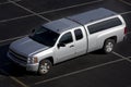 Silver Truck with a cap covering the bed