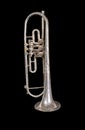 Silver trumpet isolated on a black background. Musical instrument Royalty Free Stock Photo