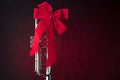 Silver Trumpet with Red Bow on Red Royalty Free Stock Photo