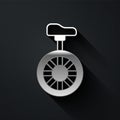 Silver Unicycle or one wheel bicycle icon isolated on black background. Monowheel bicycle. Long shadow style. Vector