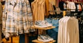 silver unisex sneakers shoes on shelf display in shop mall store. Store Of Shopping Center. retail sale Royalty Free Stock Photo