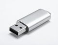 Silver USB flash drive with cap removed on a white background Keywords: USB drive, flash drive, storage, data Royalty Free Stock Photo