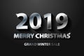 Silver Vector luxury text 2019 Merry Christmas, sale. Gold Festive Numbers Design on dark background. Silver shining glitter text Royalty Free Stock Photo