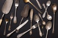 Silver vintage cutlery on black backgound, top view Royalty Free Stock Photo