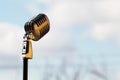 Silver vintage microphone in the studio on outdoor background Royalty Free Stock Photo