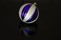 Silver and violet christmas bauble Royalty Free Stock Photo