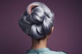 Silver violet and pink colored hair in elegant updo hairstyle.