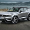 Silver Volvo XC40 Parked on the Side of a Road with Text on License Plate