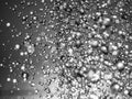 Silver water abstract splashes bokeh.