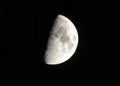 Silver waxing moon on black sky background Royalty Free Stock Photo