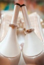 Silver wedding engagement rings on heels of bride shoes Royalty Free Stock Photo