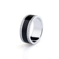 Silver wedding ring with black enamel decorated with diamonds isolated on white background Royalty Free Stock Photo