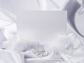 Silver wedding rings and card Royalty Free Stock Photo