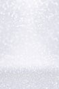 Silver white glitter snow background for Christmas or anniversary bokeh Royalty Free Stock Photo