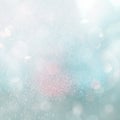 Silver white glittering Christmas lights. Blurred abstract background Royalty Free Stock Photo
