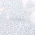 Silver white glittering Christmas lights. Blurred abstract background Royalty Free Stock Photo