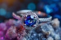 Silver or white gold ring with diamonds and blue sapphires closeup. Precious gems and metals, natural gemstone jewelry Royalty Free Stock Photo