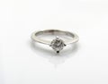 Silver women`s engagement ring with diamond Royalty Free Stock Photo