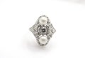 Silver women`s vintage design finger ring with diamonds and pearls