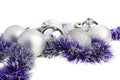 Silver Xmas balls and purple tinsel