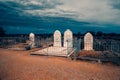 Graves of the outback desert under an impending storm