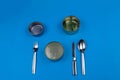 Silverware knife fork spoon napkin cans empty closed on yellow, cutlery.