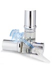 Silvery ampoules, small bottles, medical or cosmetic appointment and syringe