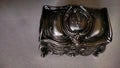 Ornamented miniature of metallic silver treasure chest Royalty Free Stock Photo
