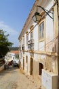 View to the street with historical buildings in Silves, Portugal. Royalty Free Stock Photo