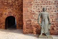 The statue of King Sancho 1st at the entrance to the medieval castle of Silves