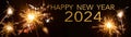Silvester / Happy New year 2024, New Year`s Eve background banner panorama greeting card - People hold sparkling sparkler in her