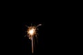 Silvester / New year background - Sparkling sparkler at dark night