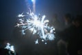 Silvester sparkler at night with people, Wunderkerze