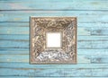 SilveVintage picture frame on blue wood background Royalty Free Stock Photo