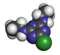 Simazine herbicide molecule. 3D rendering. Atoms are represented as spheres with conventional color coding: hydrogen white,. Royalty Free Stock Photo