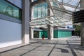 Simgapore. A woman is walking along the street, in a hurry for business. Only one person on the street Royalty Free Stock Photo