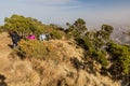 SIMIEN MOUNTAINS, ETHIOPIA - MARCH 16, 2019: Tourists hiking in Simien mountains, Ethiop