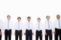 Similar looking businessmen in a row Royalty Free Stock Photo