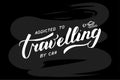 Addicted to travelling by car white lettering on black chalkboard background