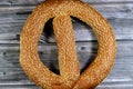 Simit, rosquilla, a circular bread, typically encrusted with sesame seeds or, less commonly, poppy, flax or sunflower seeds, found