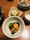 Simmered dish and steamed tofu with soy sauce.