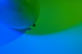 Simple abstract single air balloon color gradient background made by two colorful lights transitioning into each other.